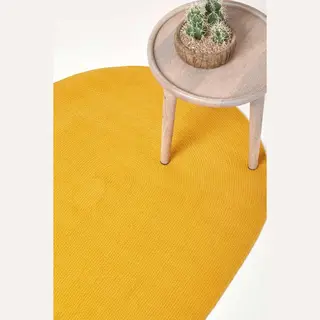 Homescapes Handmade Woven Braided Oval Rug In Mustard