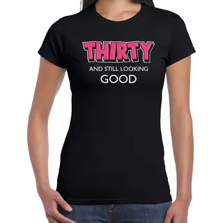 Bellatio Decorations Thirty And Still Looking Good / 30 Jaar Cadeau T-shirt / Shirt - Zwart Met Witte En Roze Letters - Voor Dames - Verjaardag Cadeau Xxl