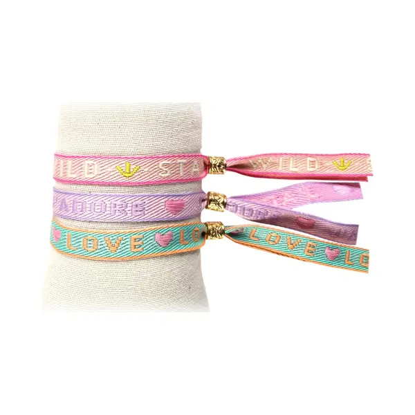 Principessa Set Van 3 Trendy Festival Lint Armbandjes Met Tekstlint - Tekst, Stay Wild, J’adore, Love - Kleur, Lichtroze, Lila, Turquoise thumbnail