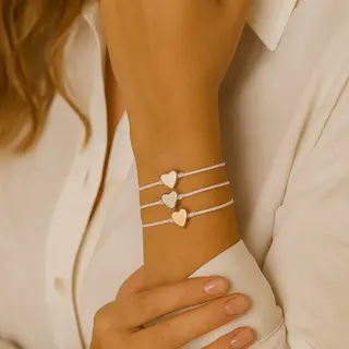 Nuvex Set Van 3 Armbanden Voor Dames En Meisjes Met Wit Koord En Hartvormige Kralen – Goudkleurig, Rosékleurig En Zilverkleurig – Verstelbaar –