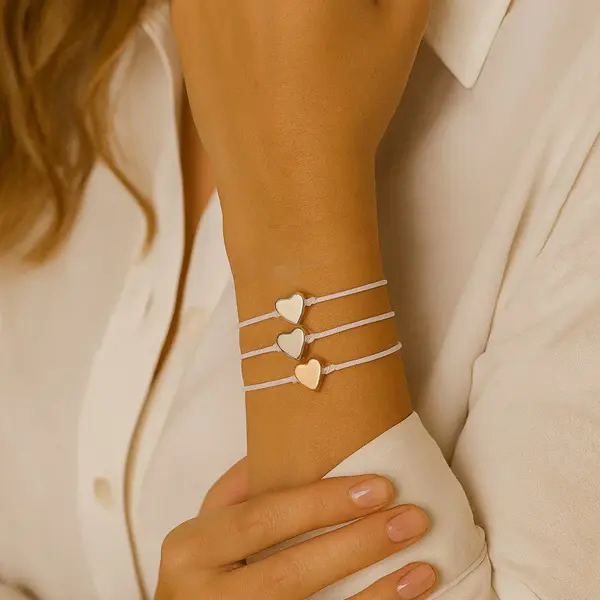 Nuvex Set Van 3 Armbanden Voor Dames En Meisjes Met Wit Koord En Hartvormige Kralen – Goudkleurig, Rosékleurig En Zilverkleurig – Verstelbaar – thumbnail