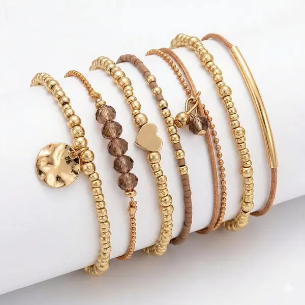 Nuvex Set Van 7 Goudkleurige Armbanden Voor Dames Met Kralen, Bedels En Bruinaccenten – Dames Armbanden Set In Natuurlijke Tinten thumbnail