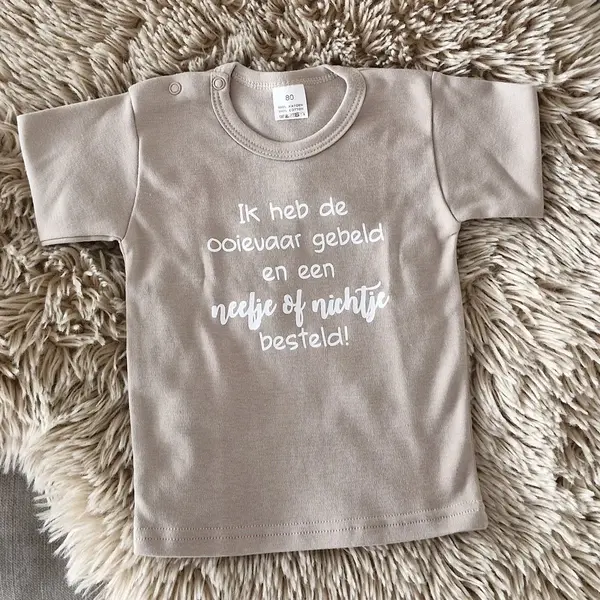 Shirt Ik Heb De Ooievaar Gebeld En Een Nichtje Of Neefje Besteld | Kort Mouw | Beige | Maat 86 Zwangerschap Aankondiging Bekendmaking Baby thumbnail