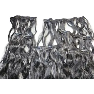Set Van 7 Clip-in Synthetische Haarextensies - Lichtblond - Golvend - 50 Cm